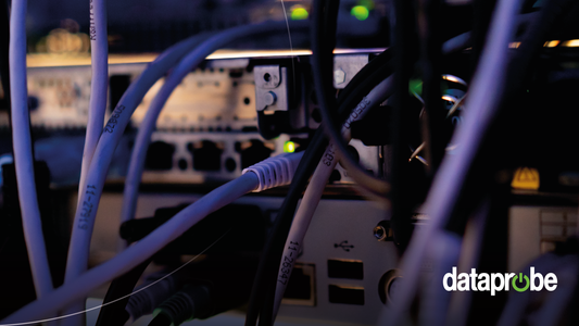 Close-up of computer network cables plugged into server racks, with a 'dataprobe' watermark in the bottom right corner.