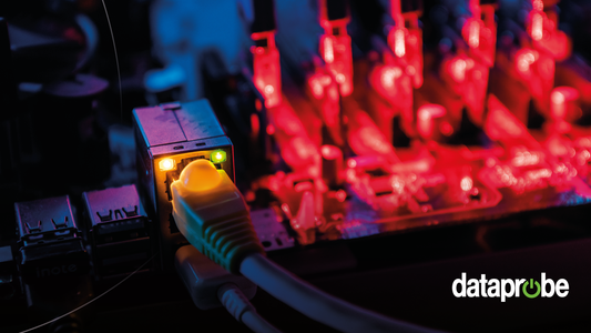 A close-up of a computer network setup with a yellow Ethernet cable plugged into a network card, with a blurred background of red illuminated electronic components. The 'dataprobe' logo is visible in the bottom right corner.